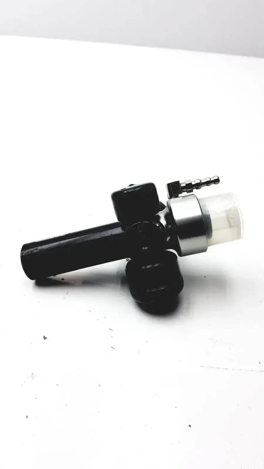 Black and silver fuel injector with transparent cap from boehringer 3704 platinum series suction regulator used medical equipment for sale