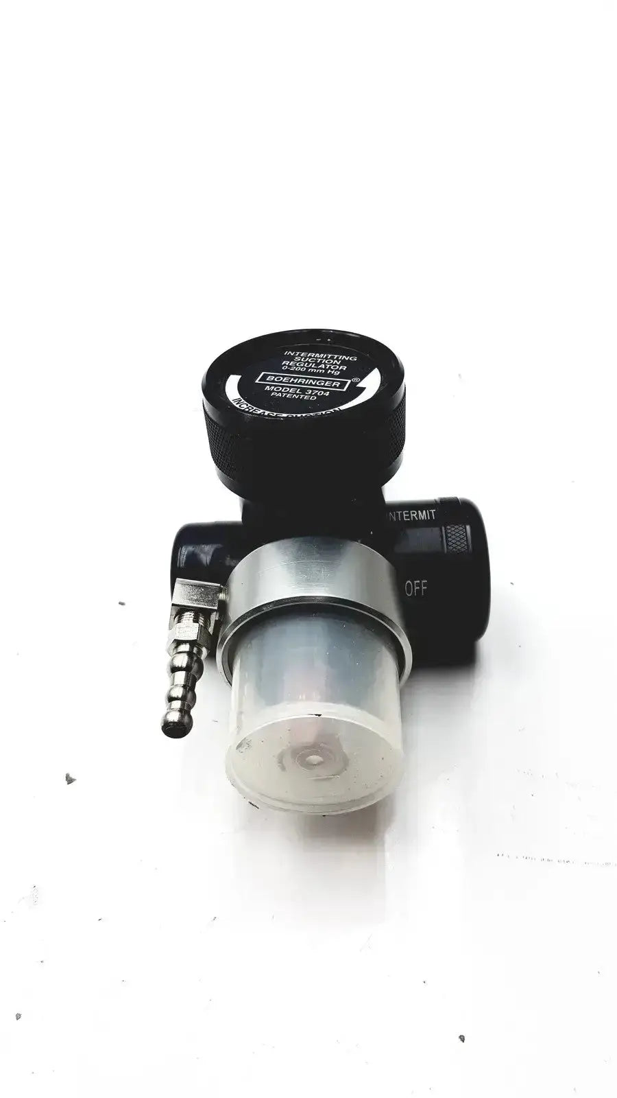 Black and silver Boehringer 3704 platinum series suction regulator with clear cylindrical filter housing for medical use