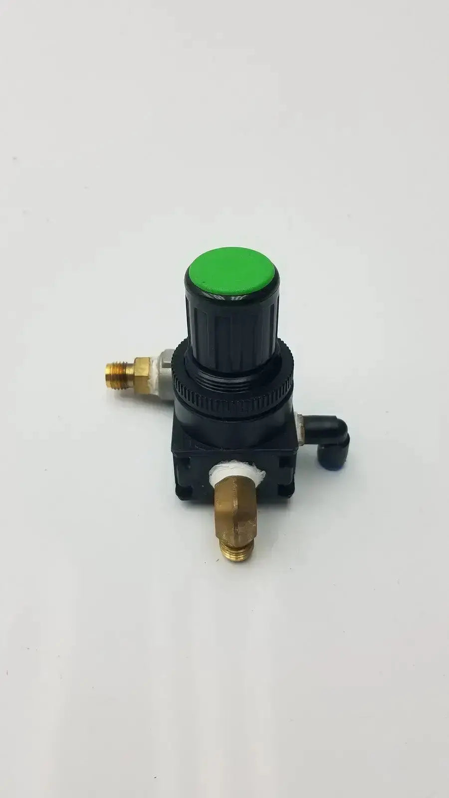 Bosch pressure reducer throttle valve featuring a black body, bright green top knob, and brass fittings for pressure control