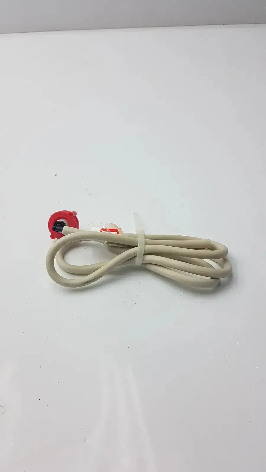 Beige coiled cable with red plastic connector and white tie for bosch water filter head hose water filter use