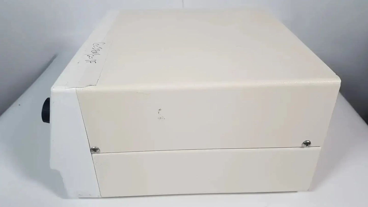 Cream-colored electrosurgical generator bovie aaron 1250 with matte finish and metallic screws for hospital surplus use