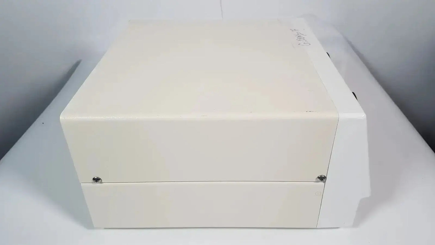 Cream-colored rectangular electrosurgical generator with matte finish and visible screws from bovie aaron hospital surplus
