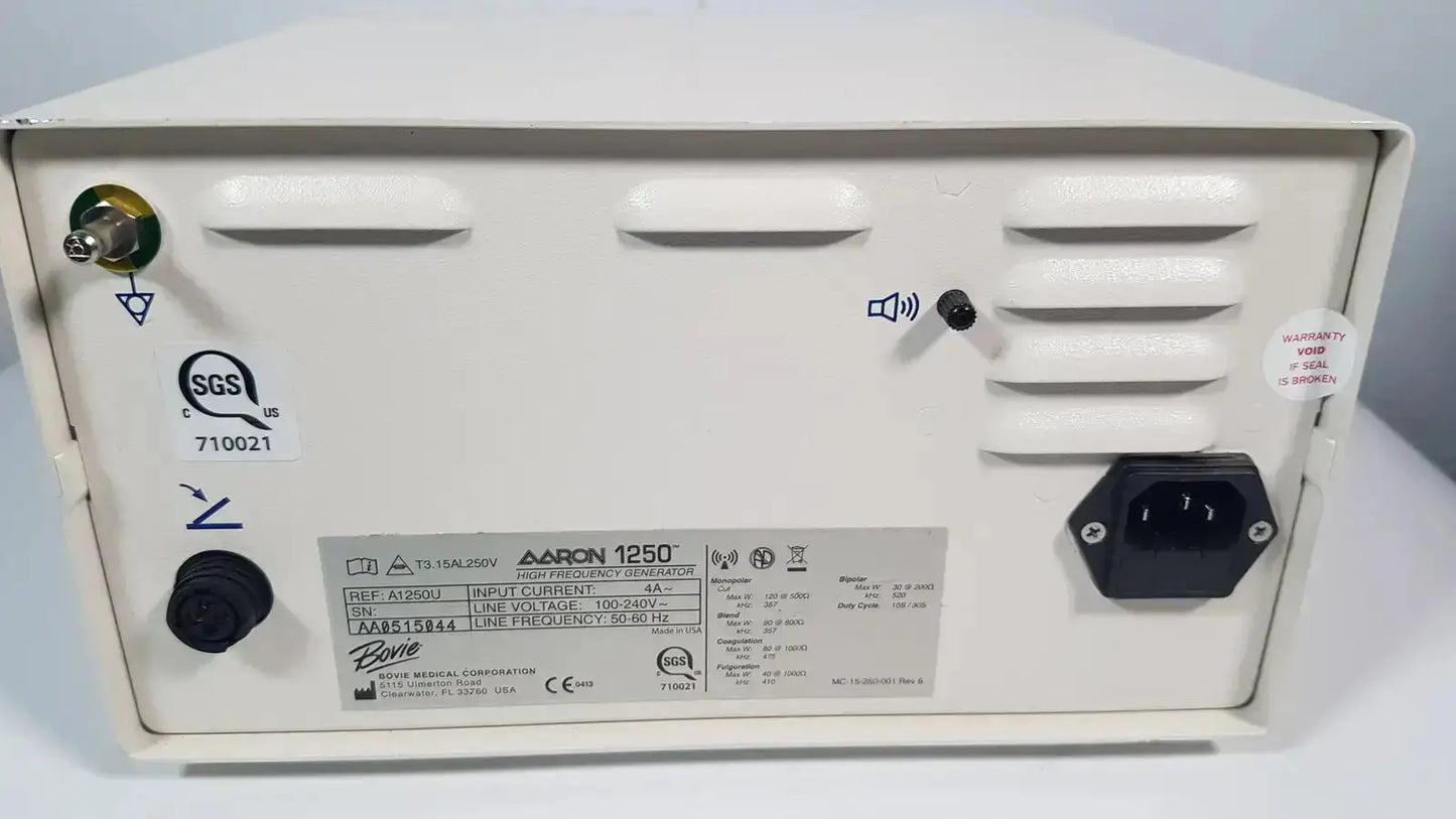 White plastic bovie aaron 1250 electrosurgical generator back with black power input and ventilation slits from hospital surplus