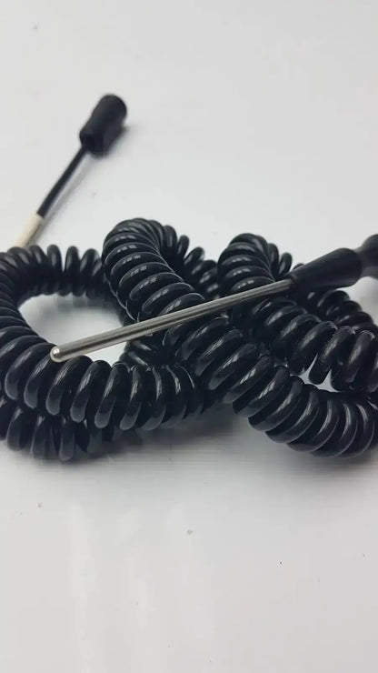 Black coiled thermometer probe cable with metallic tip and connector designed for hospital surplus use by biomedical technicians