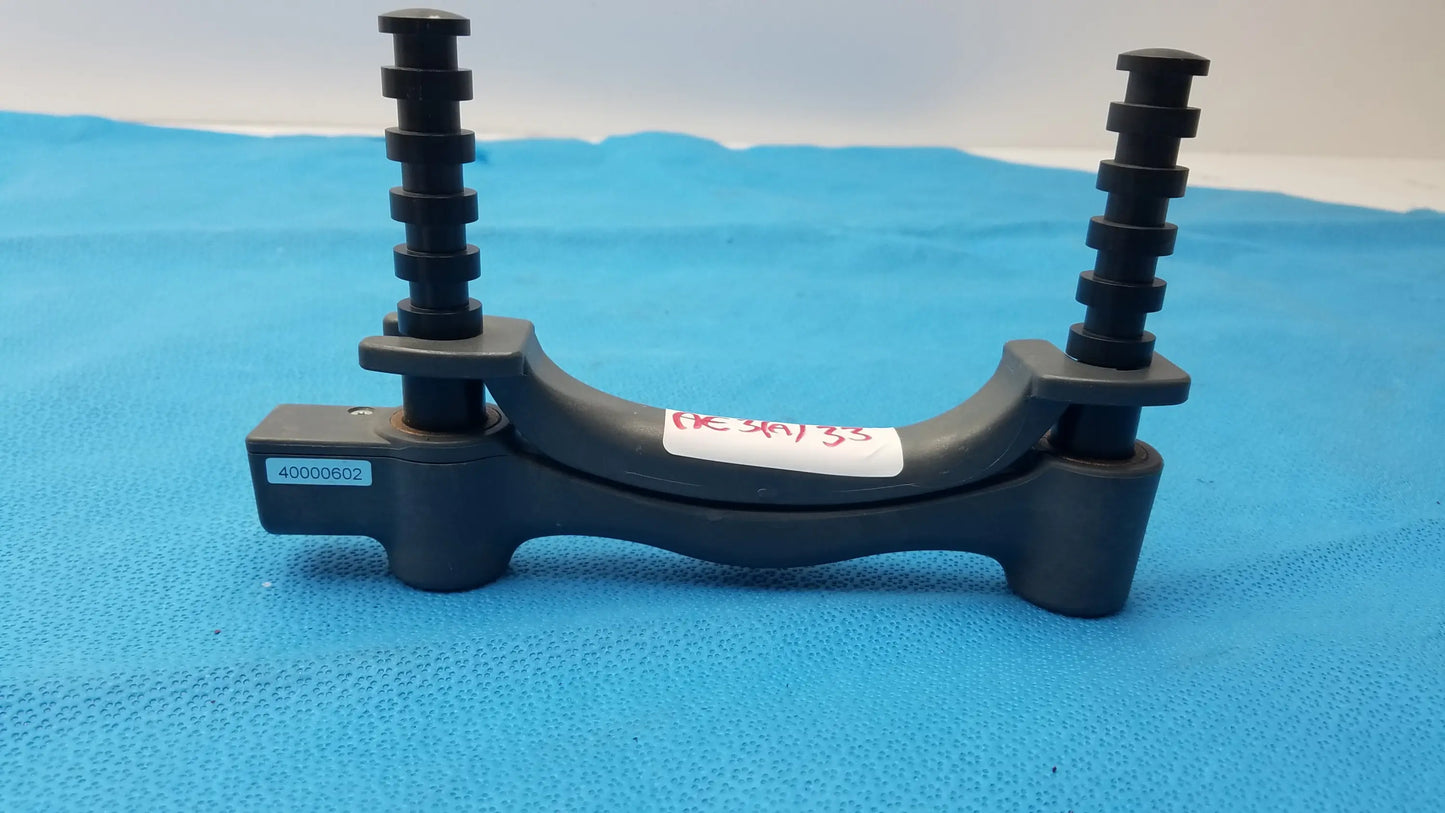 Black plastic brake caliper bracket with threaded adjustment rods for bte technology hydraulic hand dynamometer