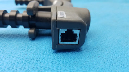 Gray plastic ethernet adapter with rj45 port and molded handle for bte technology hydraulic hand dynamometer use