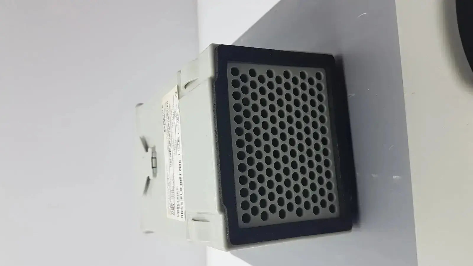 Gray rectangular buffalo filter virovac industrial sensor with black perforated front panel for smoke evacuation use