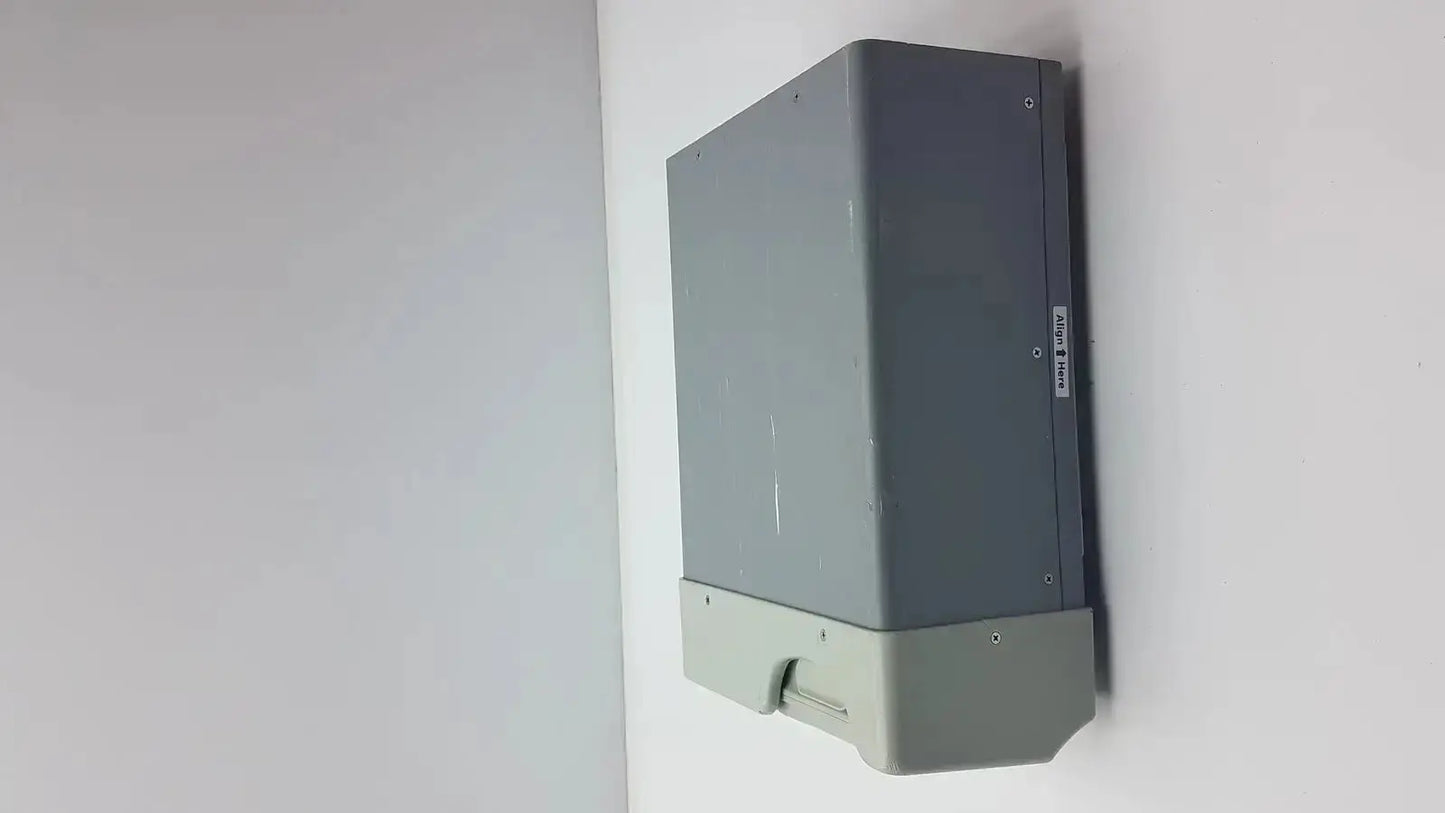 Gray rectangular wall-mounted buffalo filter virovac smoke evacuation device with visible screws and lighter gray base