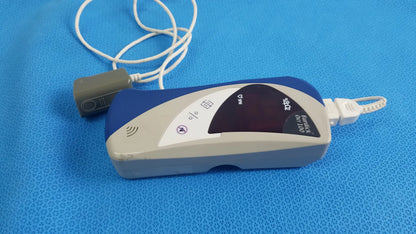 Burdick OXY 100 pulse oximeter ref 92521 medical equipment blue and gray handheld device with white cable for reuse medical equipment