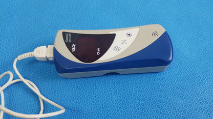 Blue and gray burdick oxy 100 pulse oximeter ref 92521 medical equipment with digital display and white power cord