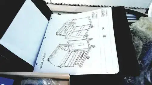 Blueprint of burlodge multigen ii blm52 multi-drawer utility cart with wheels in black-and-white line drawing for returned items