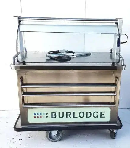 Stainless steel food cart with glass display and three drawers featuring burlodge multigen ii blm52 logo on front panel