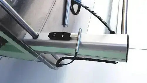 Silver metallic door closer with black rubberized grip and coiled cable for burlodge multigen ii blm52 returned items