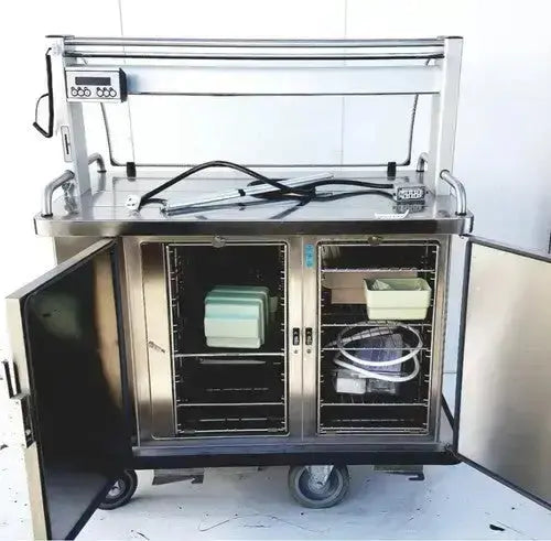 Stainless steel medical cart burlodge multigen ii blm52 with two open doors showing sterilization trays and equipment inside