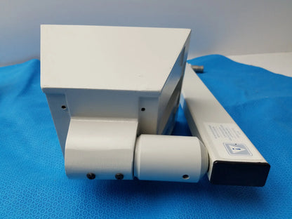 White plastic housing with internal wiring and open side panel of burton medical outpatient ii coolspot ii examination light medical equipment