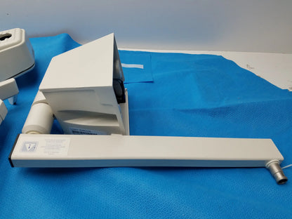 White plastic rectangular housing medical equipment with cylindrical attachment from smiths medical for reuse medical equipment