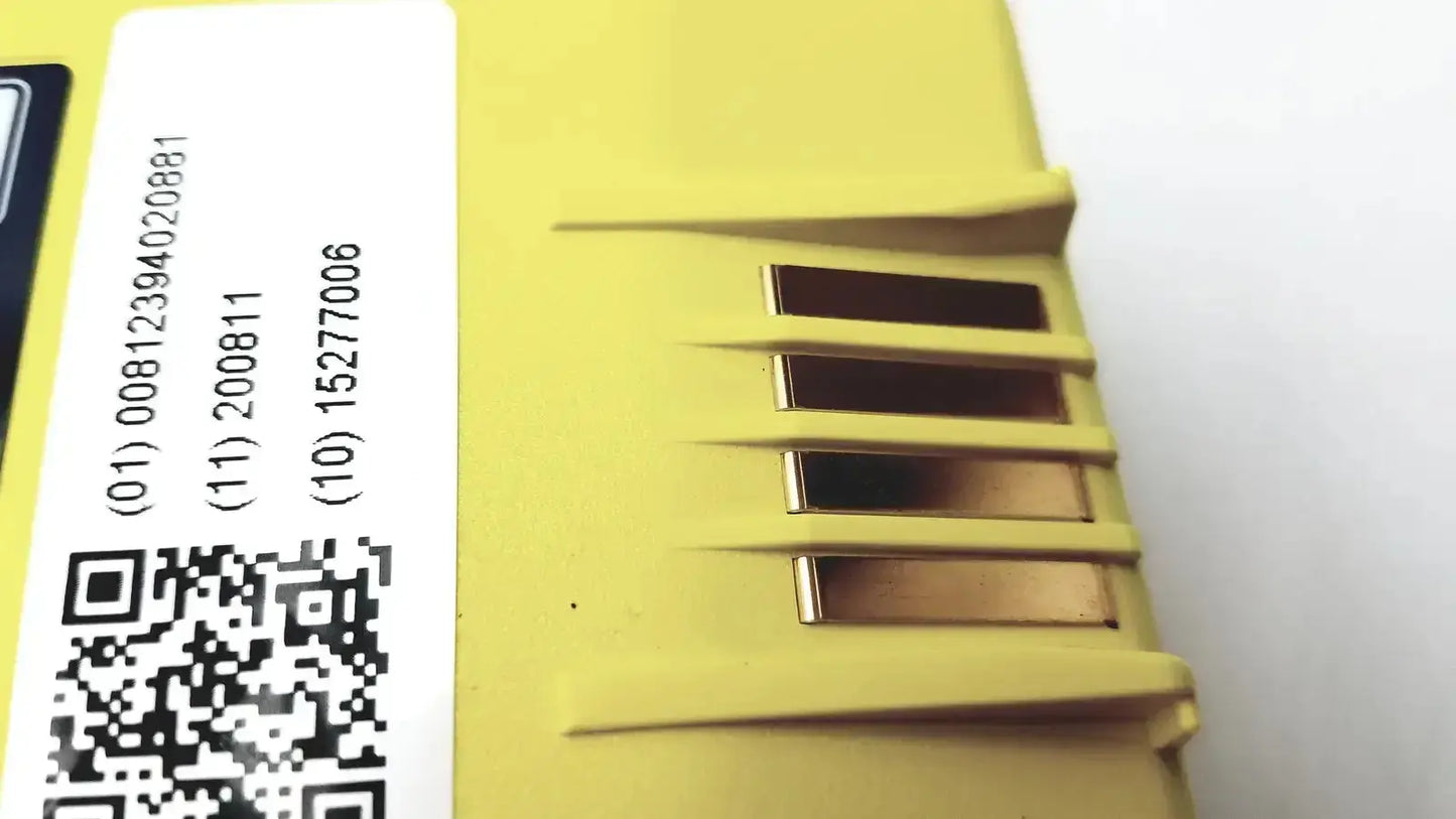 Yellow plastic industrial module with barcode label for cardiac science intellisense lithium battery powerheart g3 aed