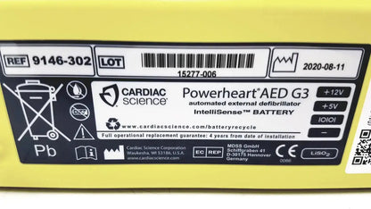 Yellow powerheart aed g3 lithium battery with black label and white text for cardiac science intellisense device