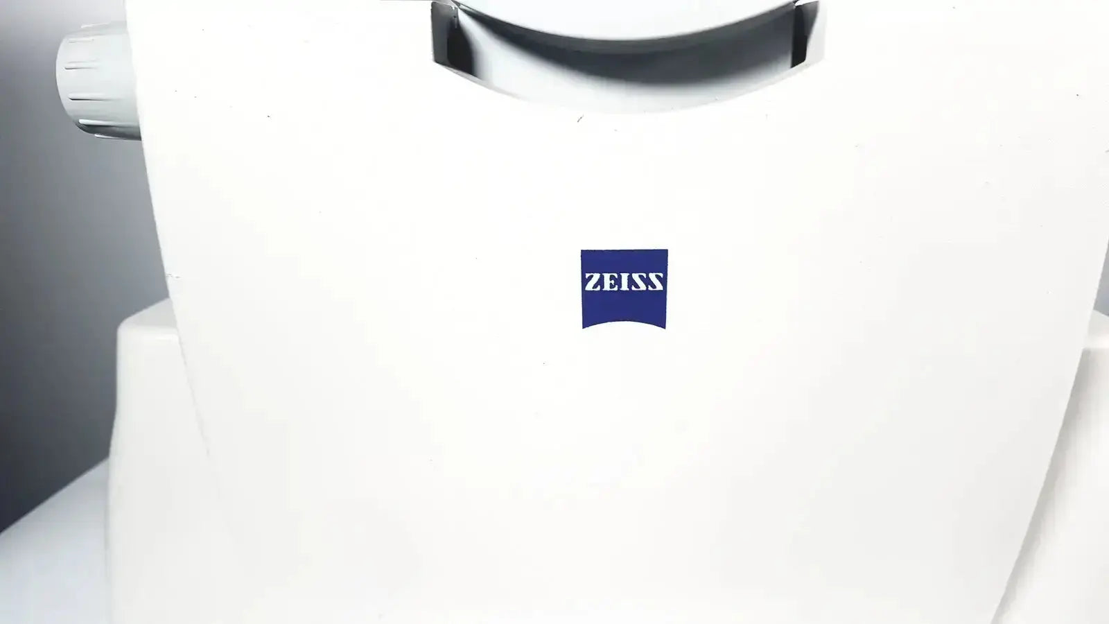 White zeiss stratus oct model 3000 patient module with sleek design and prominent blue logo for direct imaging