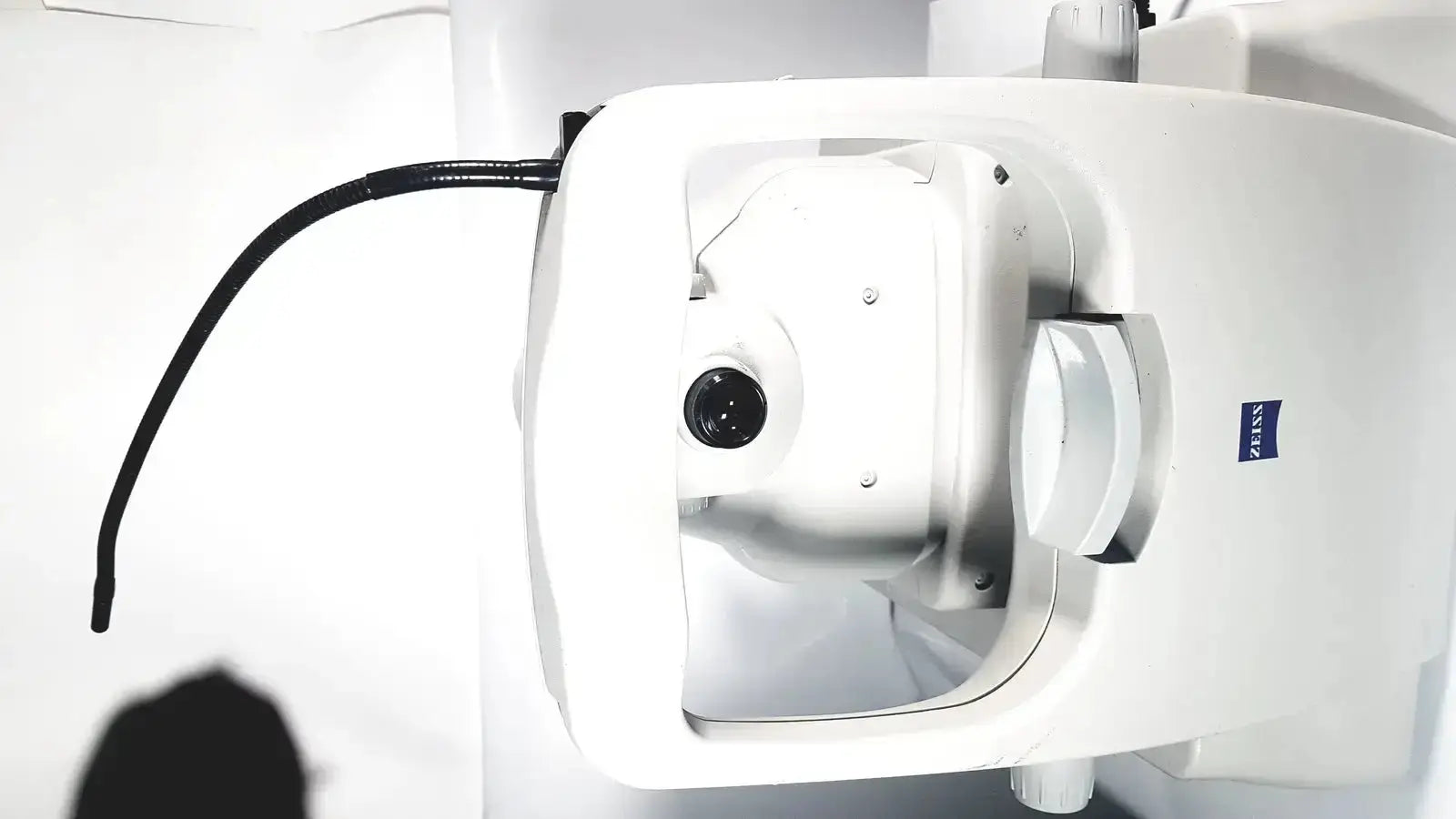 White zeiss stratus oct optical scanner with black flexible cable for patient module of stratus oct model 3000
