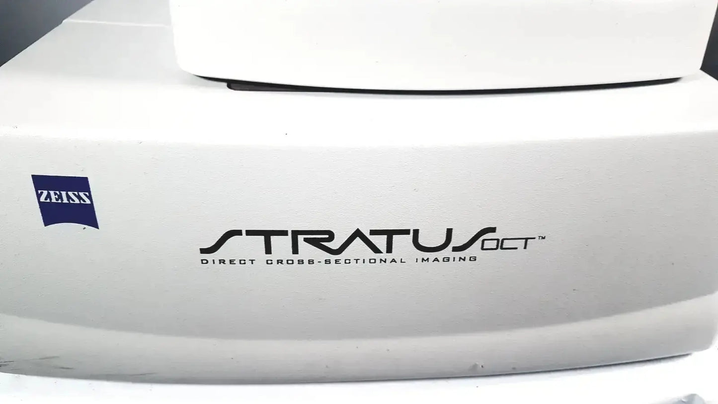 White Carl Zeiss Stratus OCT Model 3000 Direct Cross-Sectional Imaging patient module with black lettering and logo