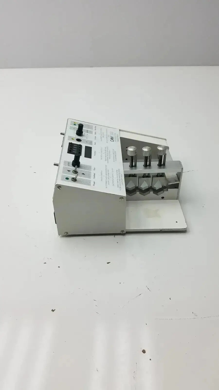 Silver metallic carnegie medicin ab model cma 100 microinjection pump with black knobs and white label panel