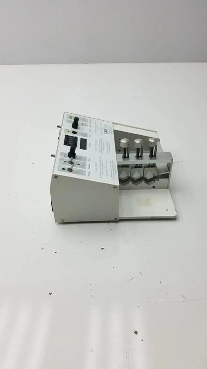 Silver metallic carnegie medicin ab model cma 100 microinjection pump with black knobs and white label panel