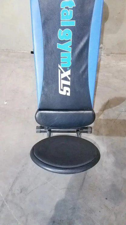 Blue and black adjustable exercise bench with total gym xls branding for versatile home workouts and strength training