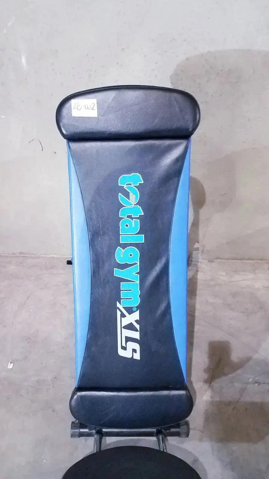 Black and blue total gym xls adjustable exercise bench with padded upholstery in chuck norris total gym xls with foot stand wing bar