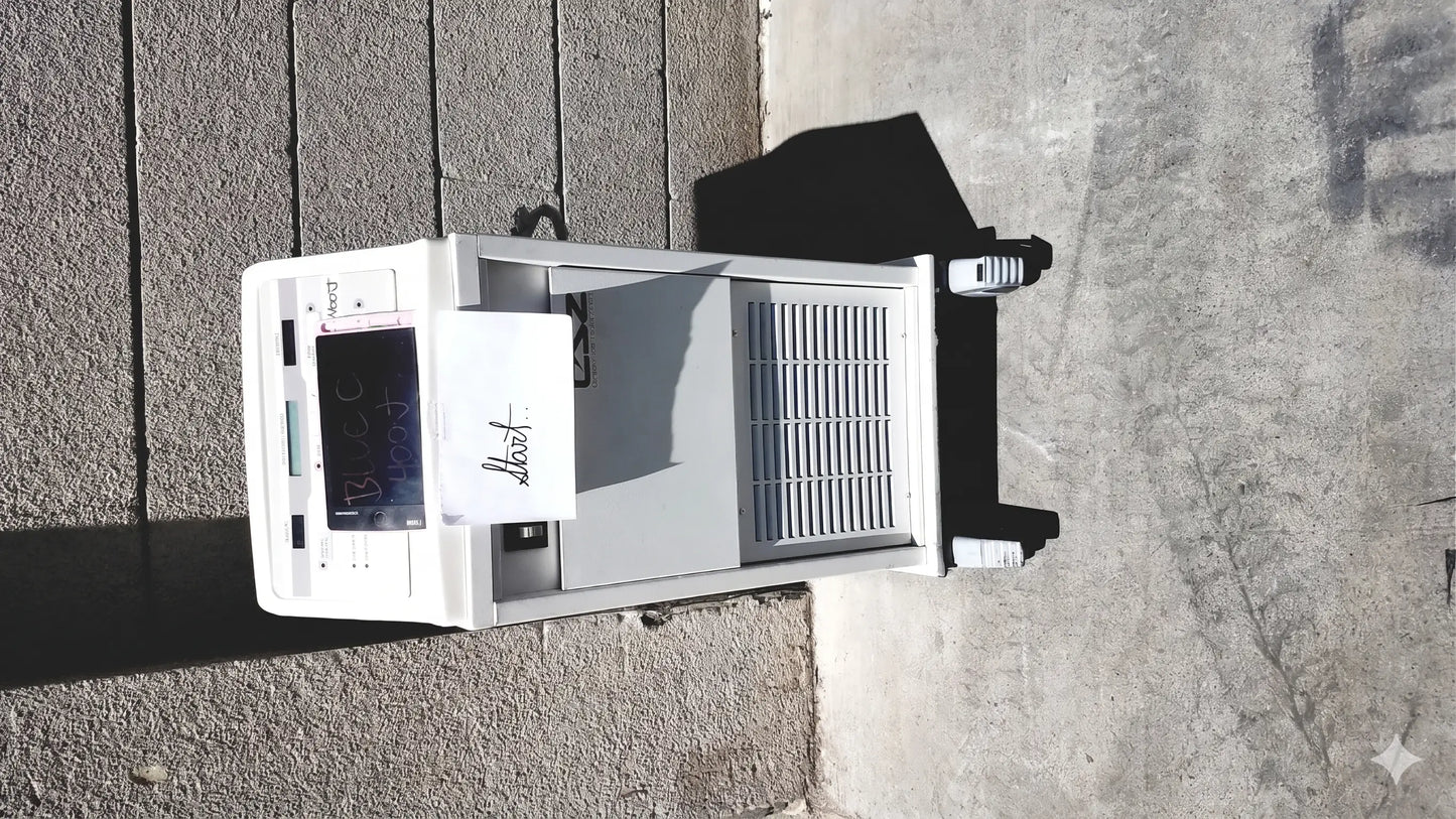 White plastic cincinnati sub-zero csz blanketrol ii 222r hyper hypothermia unit with vented side panel and handwritten label