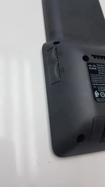 Black cisco 8800 series kem expansion module with matte finish and labeled specifications on rear panel for audio cp-8800-a-kem
