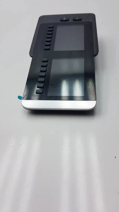 Black and silver dual-screen tablet with tactile buttons side expansion module from cisco 8800 series kem audio cp-8800-a-kem