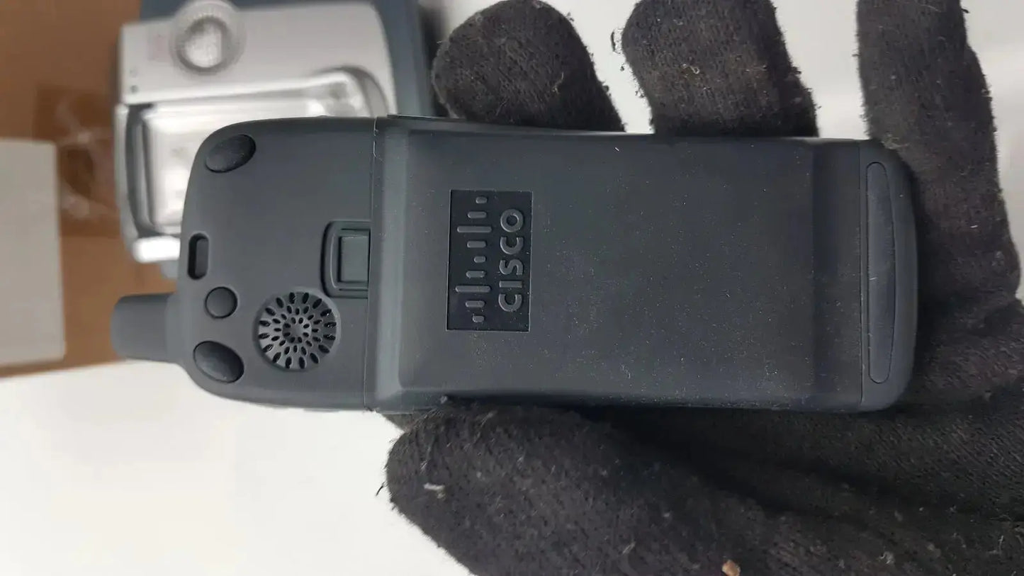 Black cisco cp-7921g-a-k9 wireless ruggedized handheld device with speaker grille and side buttons for communication