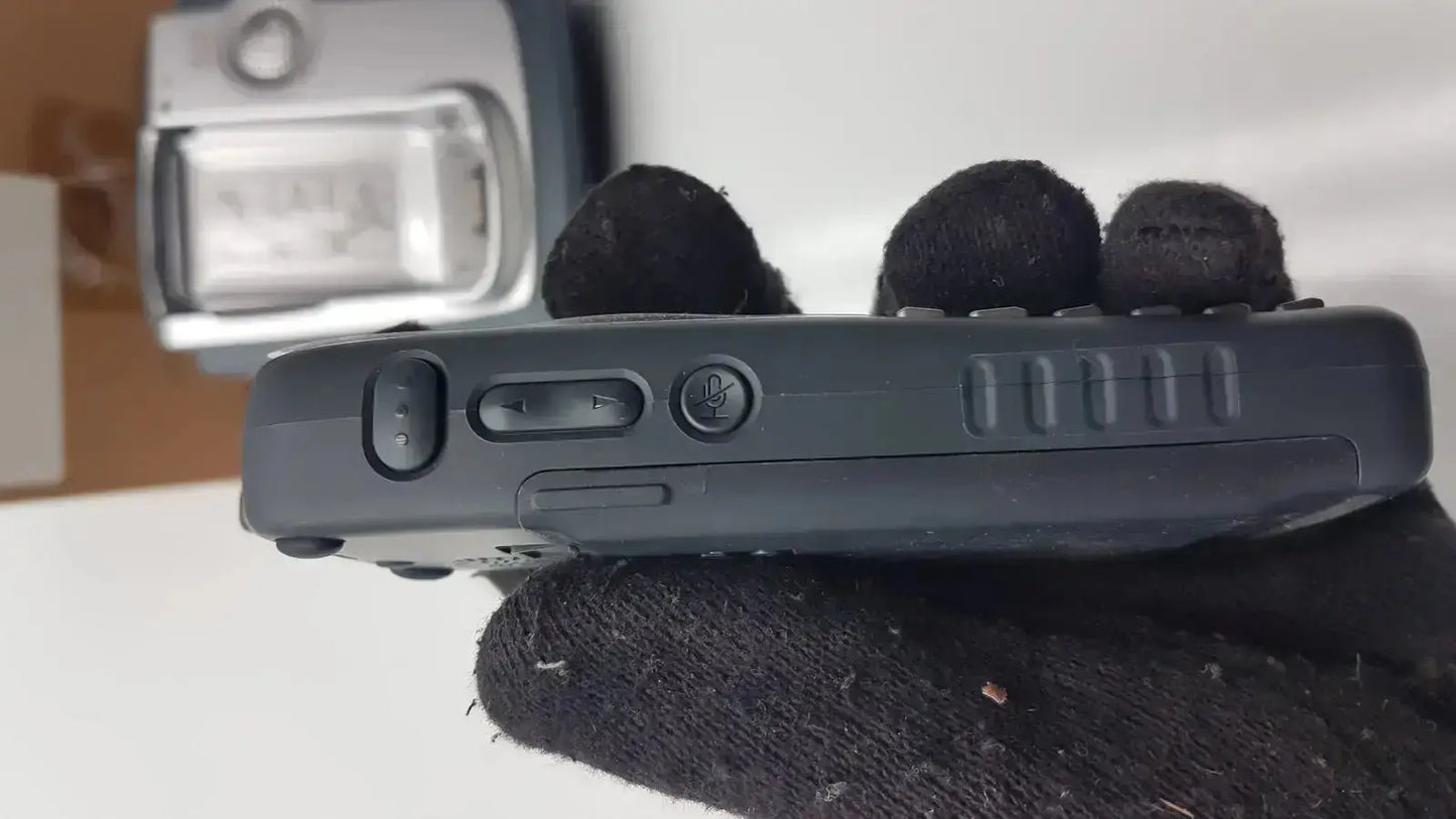 Black rugged cisco cp-7921g-a-k9 wireless walkie-talkie with textured grip and multiple control buttons