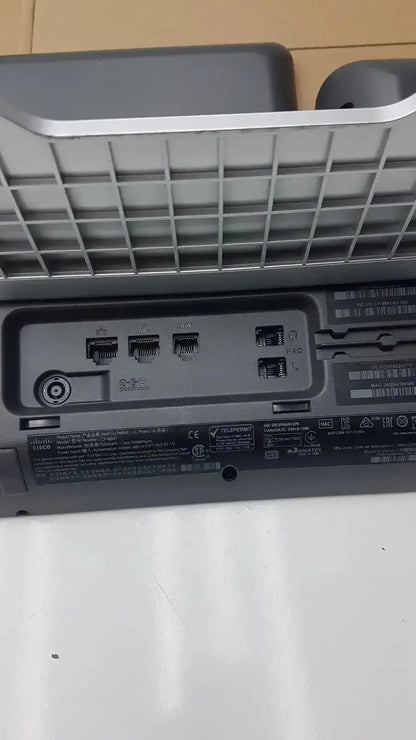 Back side of gray plastic Cisco CP-8841 IP phone color voip poe with silver trim and ethernet usb power ports
