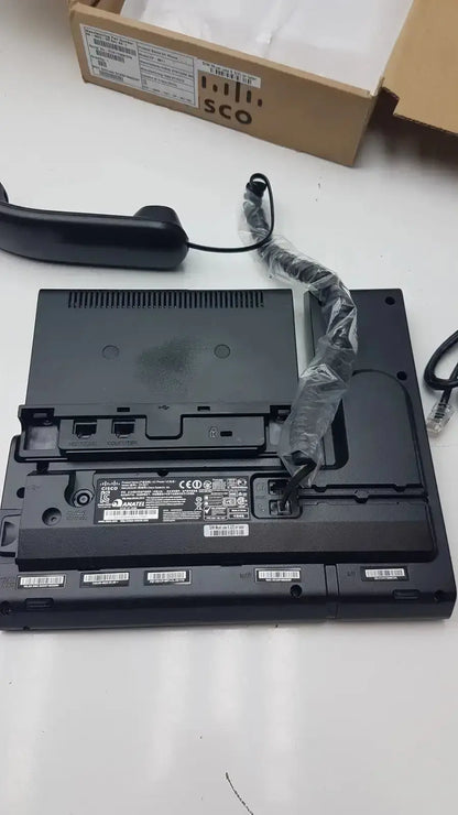 Black cisco cp-9971 ip color office phone base with coiled cord and attached handset for office use