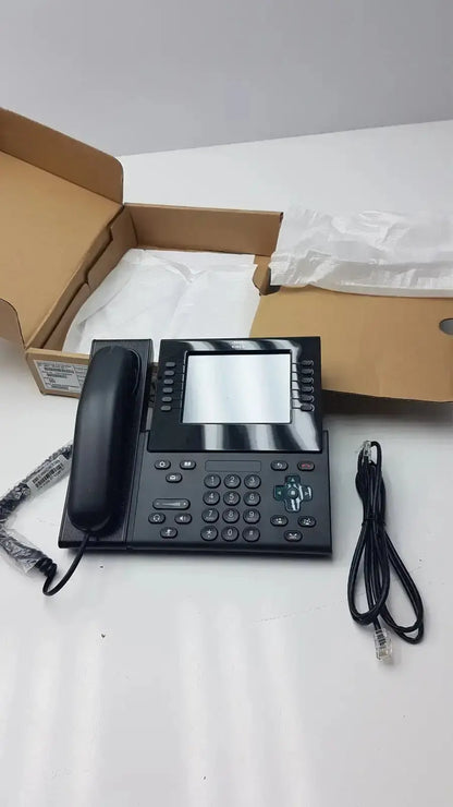 Black Cisco CP-9971 IP color office phone with touchscreen display and multiple function buttons for efficient office use