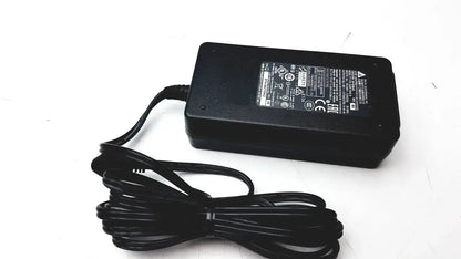 Black plastic cisco ip phone power supply cp-pwr-cube-3 with coiled power cord for reliable phone power supply