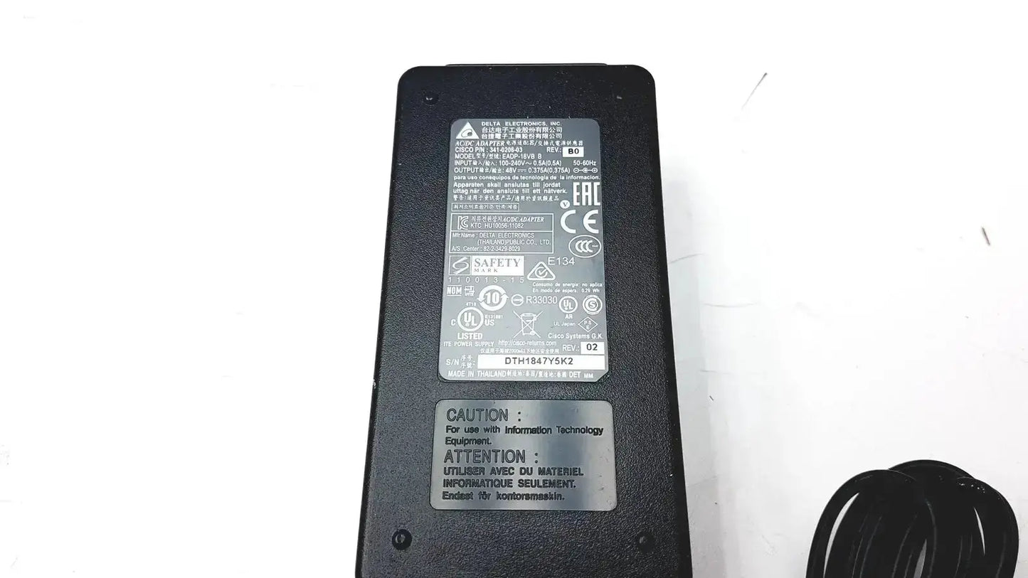 Black plastic Cisco ip phone power supply cp-pwr-cube-3 with coiled power cord for reliable phone power supply use