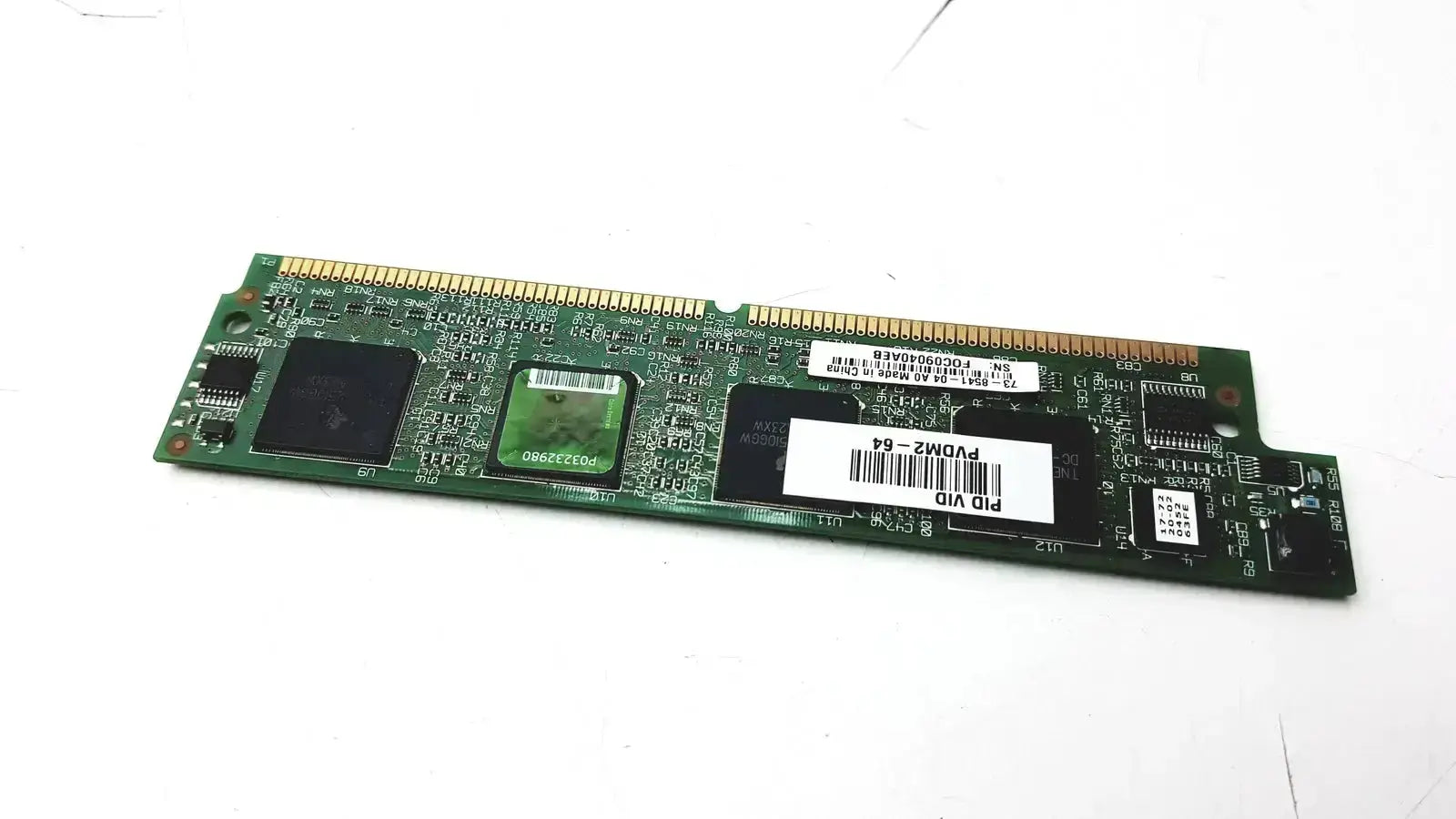 Green circuit board of Cisco PVDM2-64 high density voice dsp module with black chips white labels and gold contacts