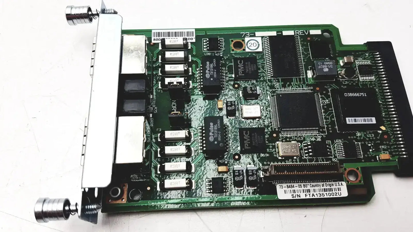 Green circuit board with silver connectors and black chips of cisco vwic2 2mft-t1 e1 2-port voice wan module