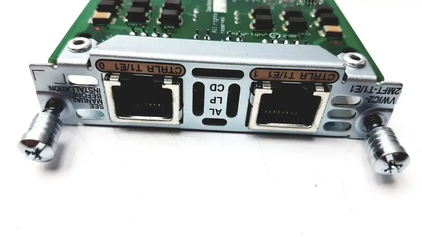 Silver metallic cisco vwic2 2mft-t1 e1 2-port voice wan card with two ethernet ports and green circuit board background