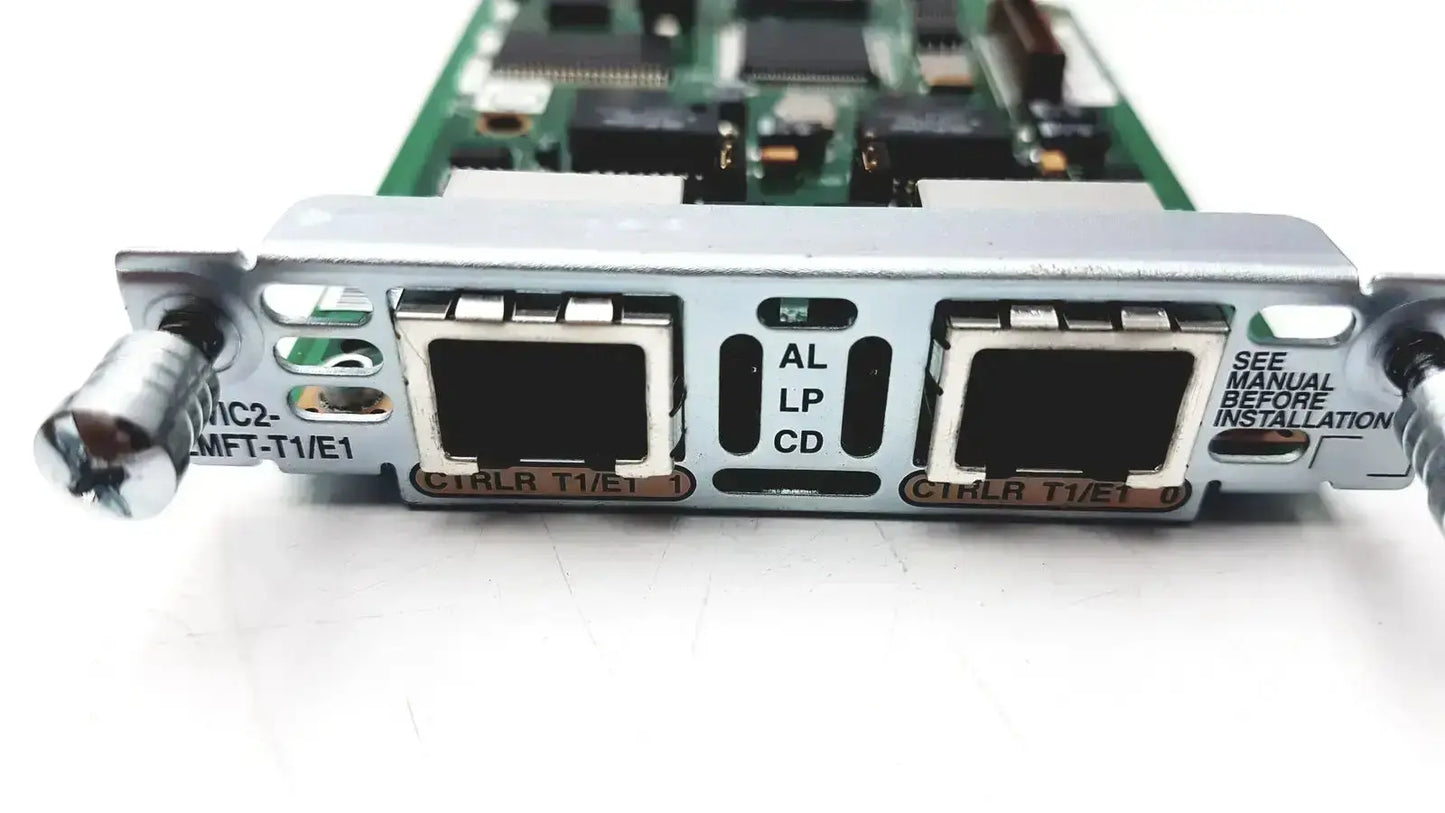 Silver cisco vwic2 2mft-t1 e1 2-port voice wan network interface card with two ethernet ports on green circuit board