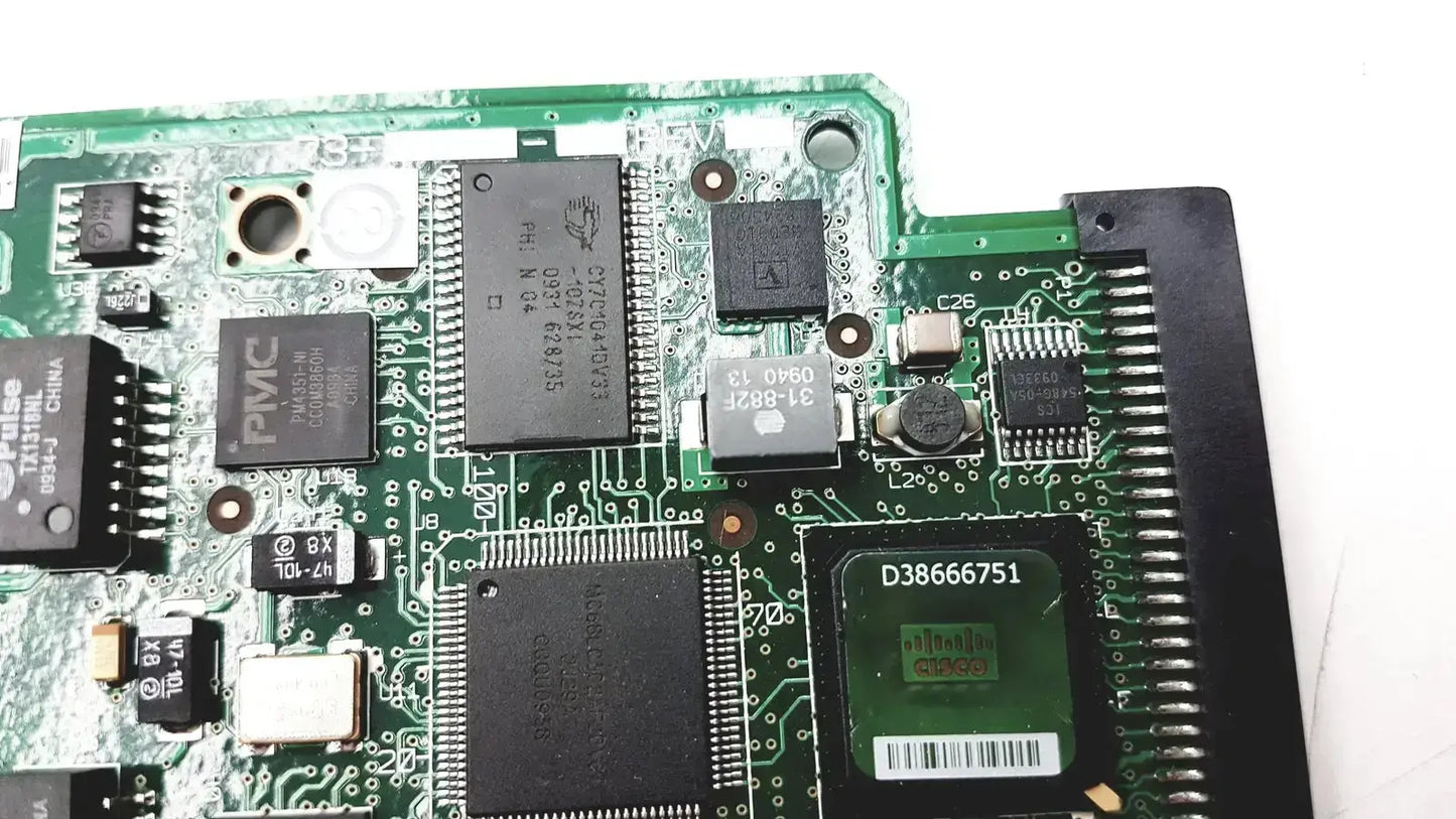 Green circuit board with black integrated circuits and silver solder points in cisco vwic2 2mft-t1 e1 2-port voice wan module