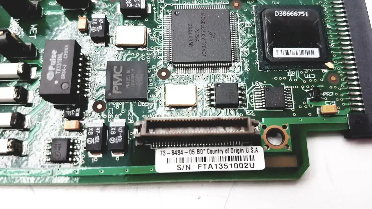Green circuit board of cisco vwic2 2mft-t1 e1 2-port wan voice module with black integrated circuits and silver connectors