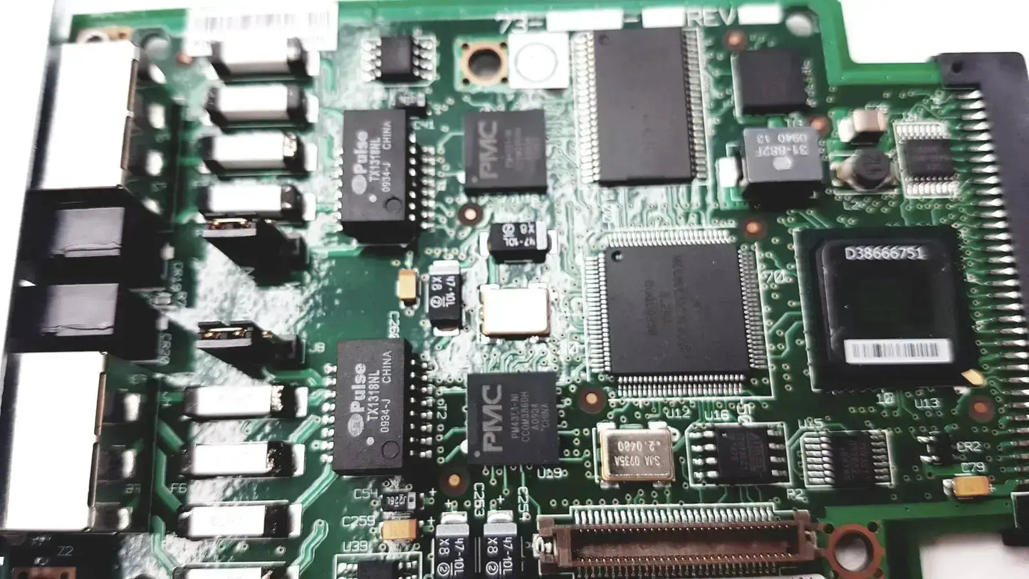 Green circuit board with black integrated circuits and silver connectors of cisco vwic2 2mft-t1 e1 2-port voice wan module
