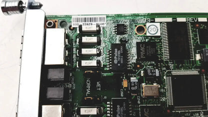 Green circuit board with black integrated circuits and silver connectors of cisco vwic2 2mft-t1 e1 2-port voice wan module