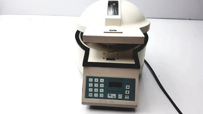 Cream-colored clay adams becton dickinson sero-fuge 2001 centrifuge with digital keypad and black accents