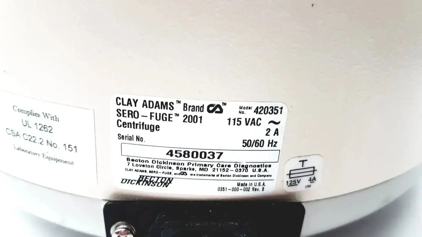 Clay adams becton sero-fuge 2001 centrifuge with white clay body black base and detailed voltage and manufacturer label