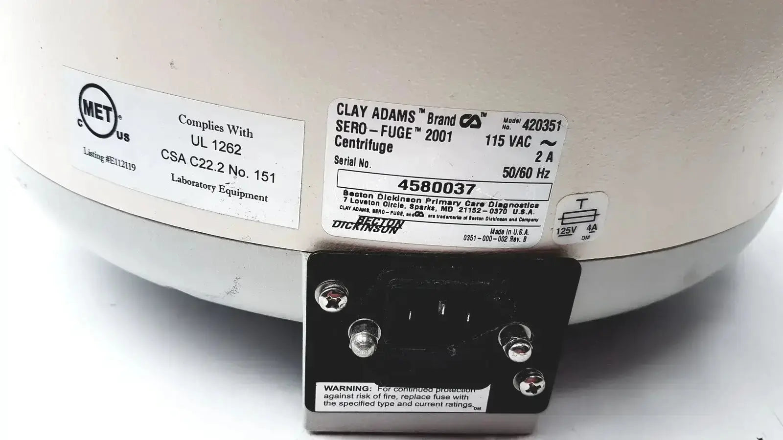 White clay adams becton dickinson sero-fuge 2001 centrifuge back with black power input plate and certification labels